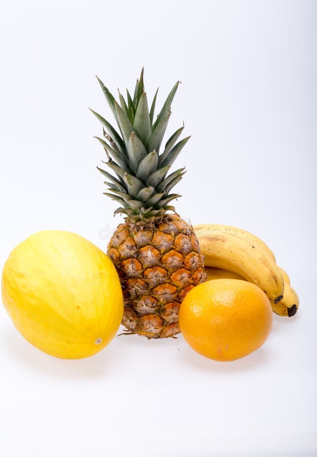 Assortiment des fruits exotiques frais sur le blanc photos stock Assortiment des fruits exotiques frais sur le blanc photos stock
