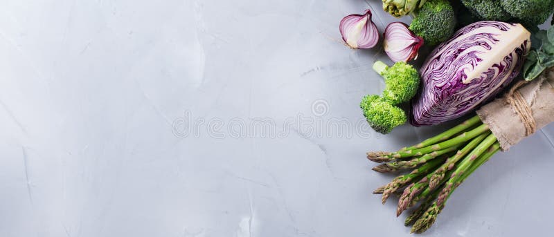 Assortment of fresh organic farmer vegetables food for cooking vegan vegetarian diet and nutrition. Copy space background, top view flat lay overhead. Assortment of fresh organic farmer vegetables food for cooking vegan vegetarian diet and nutrition. Copy space background, top view flat lay overhead