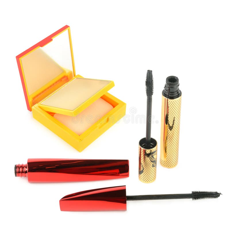 Assortment of Beauty Products: Compact Powder and Mascara on White stock photos