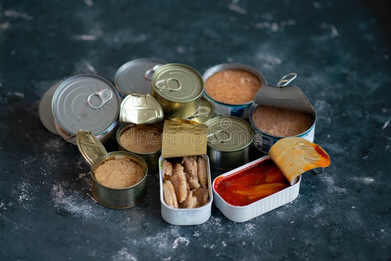 Assortment of Cans of Canned with Different Types of Fish and Seafood