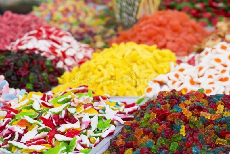 Assortment colorful gummy candies at market selective focus royalty free stock photo