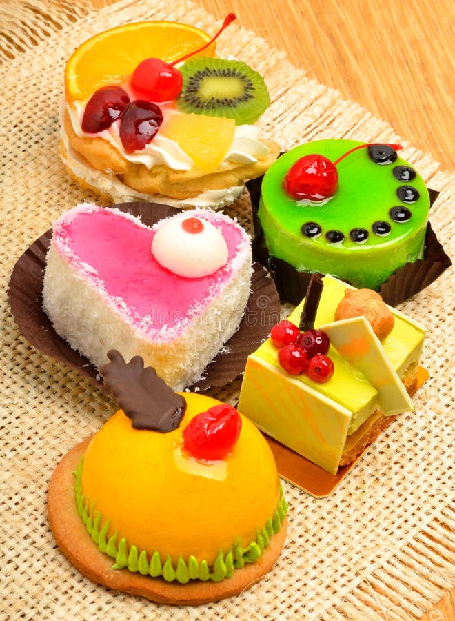 Assortment of Delicious Cakes, Pies, Tarts with Fuits and Cream Stock
