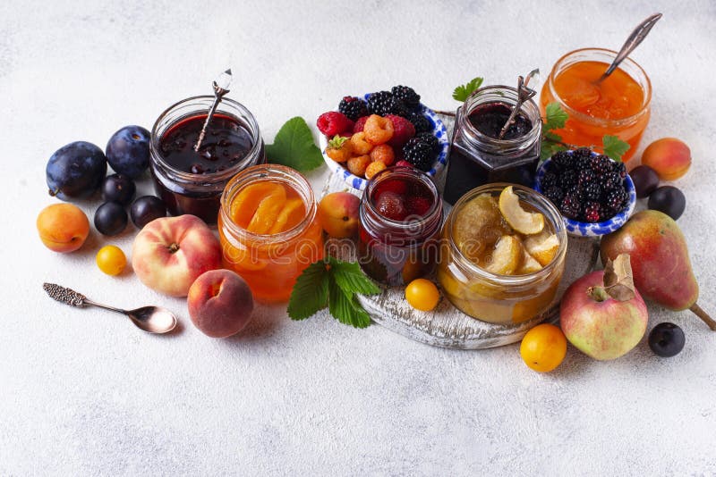 Assortment of different homemade jams in jars. Various sweet preserves stock images, royalty-free photos and pictures