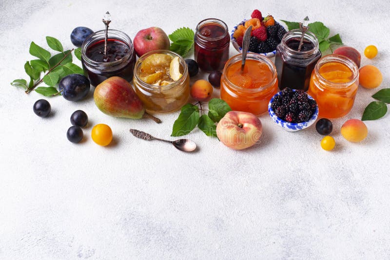 Assortment of different homemade jams in jars. Various sweet preserves stock images, royalty-free photos and pictures