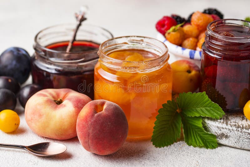 Assortment of different homemade jams in gars. Various sweet preserves stock images, royalty-free photos and pictures
