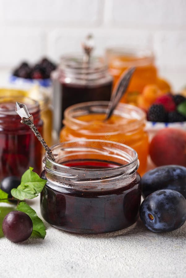 Assortment of different homemade jams in gars. Various sweet preserves stock images, royalty-free photos and pictures