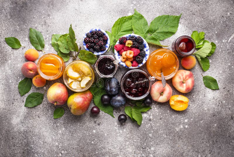 Assortment of different homemade jams in gars. Various sweet preserves stock images, royalty-free photos and pictures