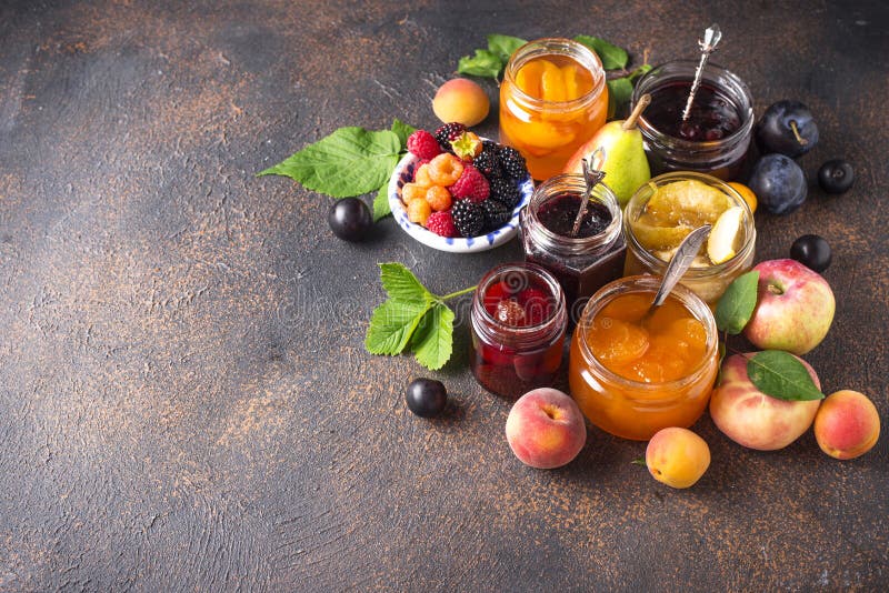 Assortment of different homemade jams in jars. Various sweet preserves stock images, royalty-free photos and pictures