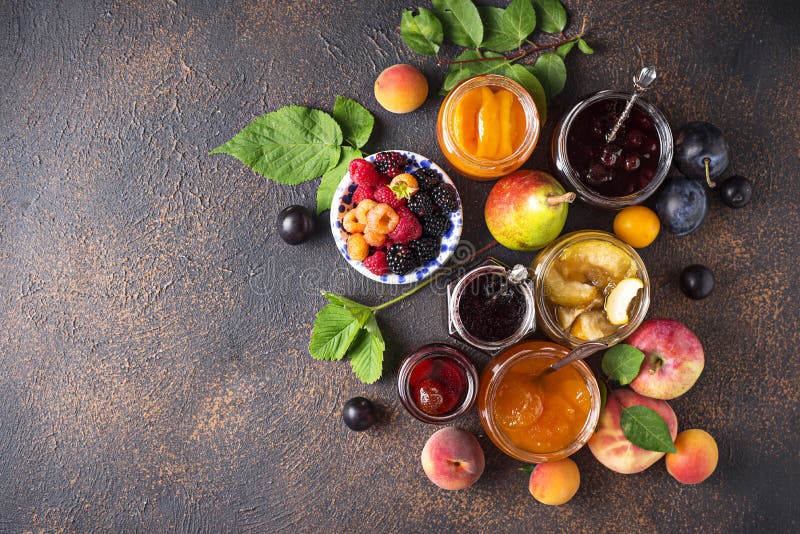 Assortment of different homemade jams in jars. Various sweet preserves stock images, royalty-free photos and pictures