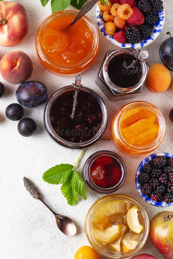 Assortment of different homemade jams in jars. Various sweet preserves stock images, royalty-free photos and pictures