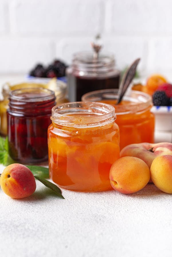 Assortment of different homemade jams in jars. Various sweet preserves stock images, royalty-free photos and pictures