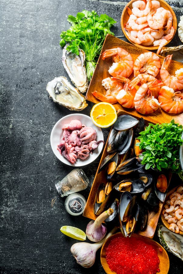 Seafood. Different Fish with Oysters, Crab and Baby Octopus Stock Image