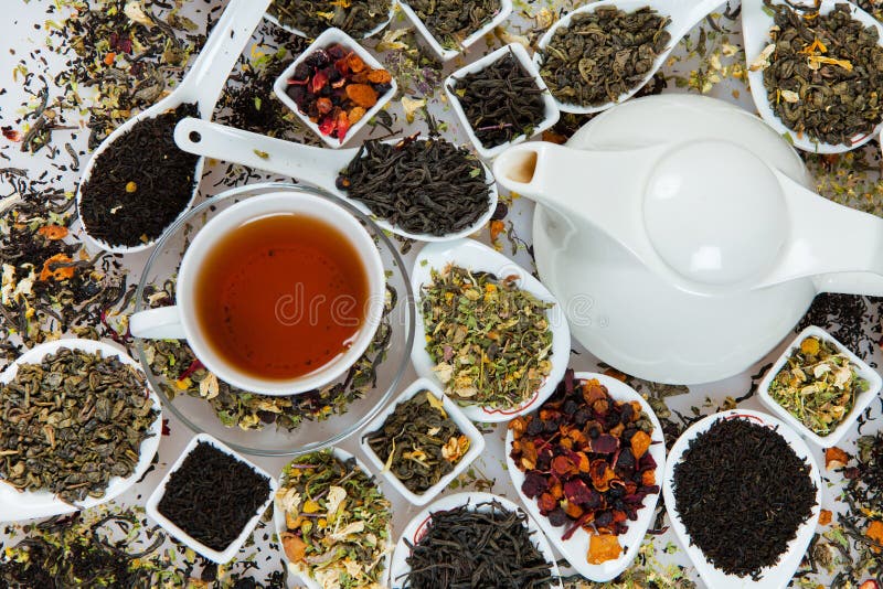 Assortment of dry tea. Various kinds of tea isolated on white.Different kinds of tea leaves. Tea composition with different kind stock photography Assortment of dry tea. Various kinds of tea isolated on white.Different kinds of tea leaves. Tea composition with different kind stock photography