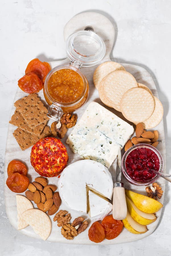 Gourmet cheeses stock photo. Image of cheeseboard, grape 27360416
