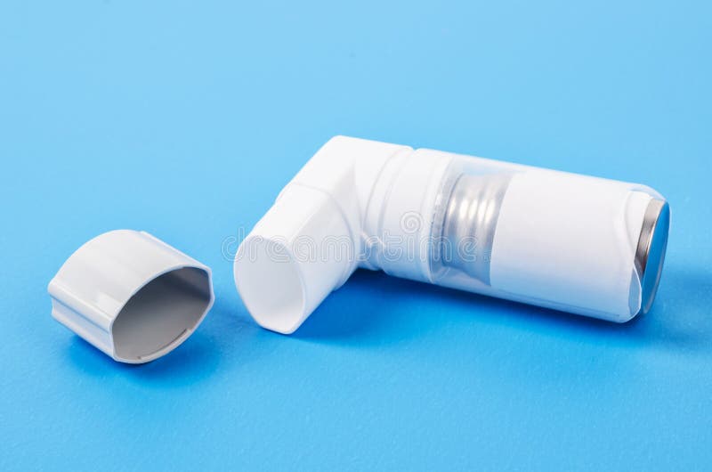 Blue asthma drug inhaler stock photo. Image of plastic 59899434