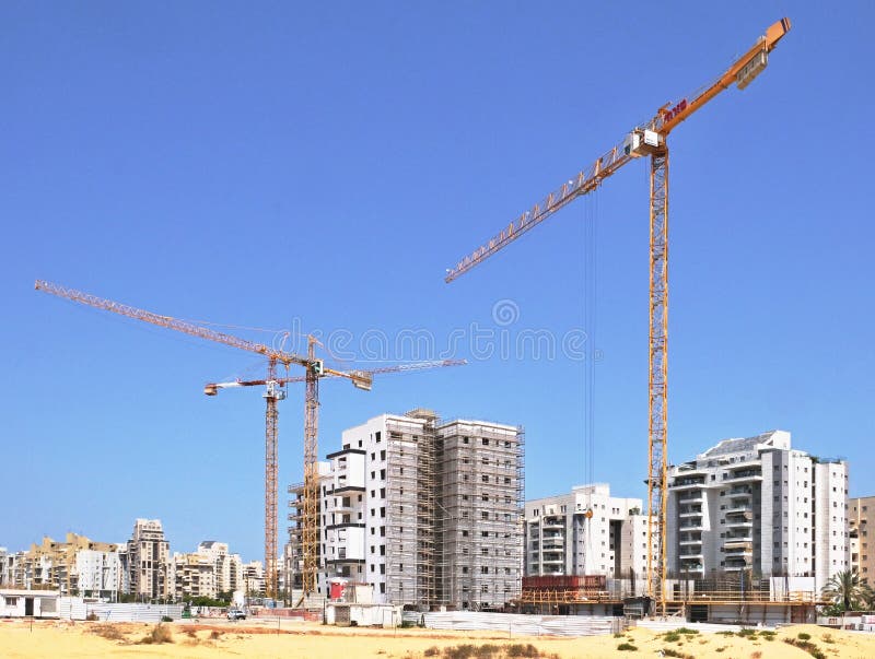 Astillero de construcci?n de viviendas de casas en una nueva ?rea de la ciudad Holon en Israel imágenes de archivo libres de regalías Astillero de construcci?n de viviendas de casas en una nueva ?rea de la ciudad Holon en Israel imágenes de archivo libres de regalías