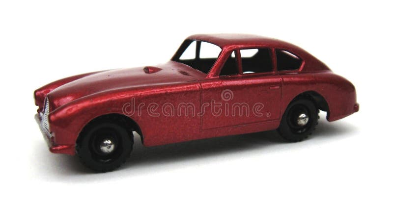 Matchbox #53 Aston Martin DB2 was first issued in 1958 in metallic green with metal or grey plastic wheels, and in this metallic red version with either black or grey plastic wheels. 2007 value of this variation is estimated around $300!