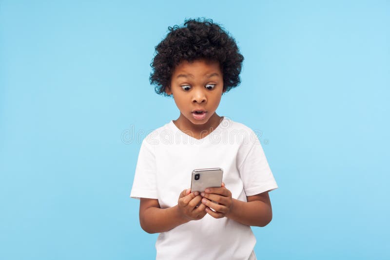 Cute Little Boy with Curly Hair Reading Message on Smartphone and Expressing Amazement Shock Stock Image - Image of african, isolated: 229714395 Cute Little Boy with Curly Hair Reading Message on Smartphone and Expressing Amazement Shock Stock Image - Image of african, isolated: 229714395