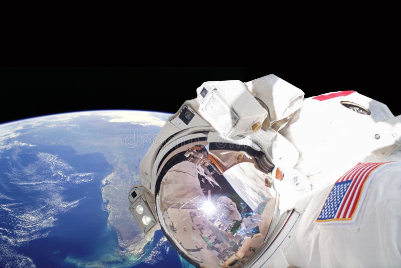 Astronaut in outer space, in background our earth. Astronaut in outer space, in background our earth