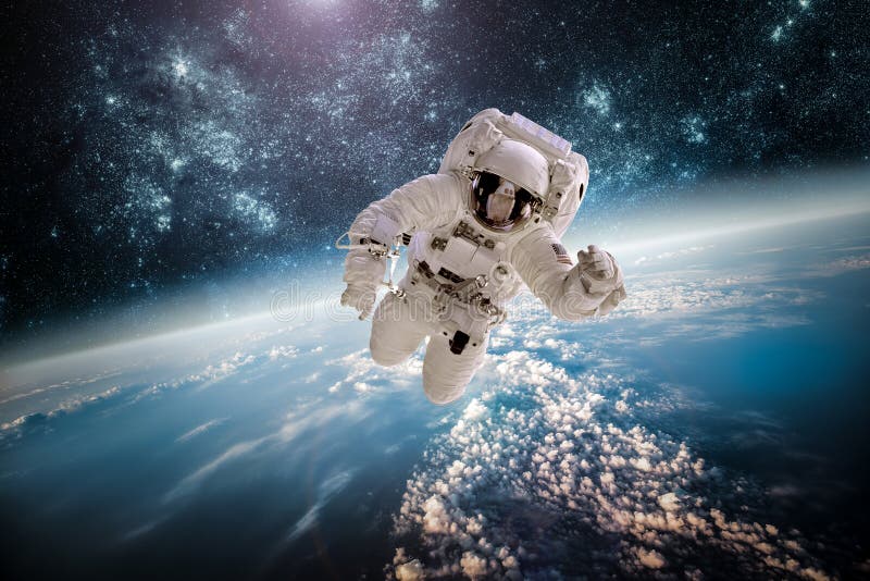 Astronaut im Weltraum vor dem hintergrund des Planeten Erde.