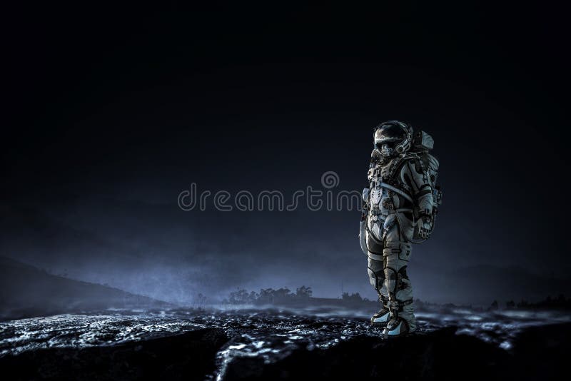 Astronaut walking on an unexplored planet stock photos