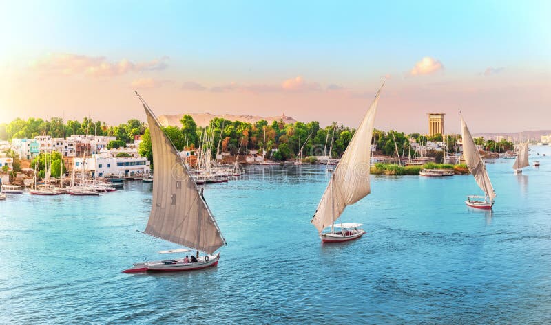 Aswan, Nile River scenery with famous sailboats, Egypta