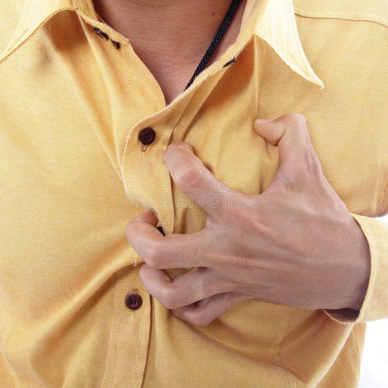 Ataque del corazón, mano del uso que ase un pecho imágenes de archivo libres de regalías Ataque del corazón, mano del uso que ase un pecho imágenes de archivo libres de regalías