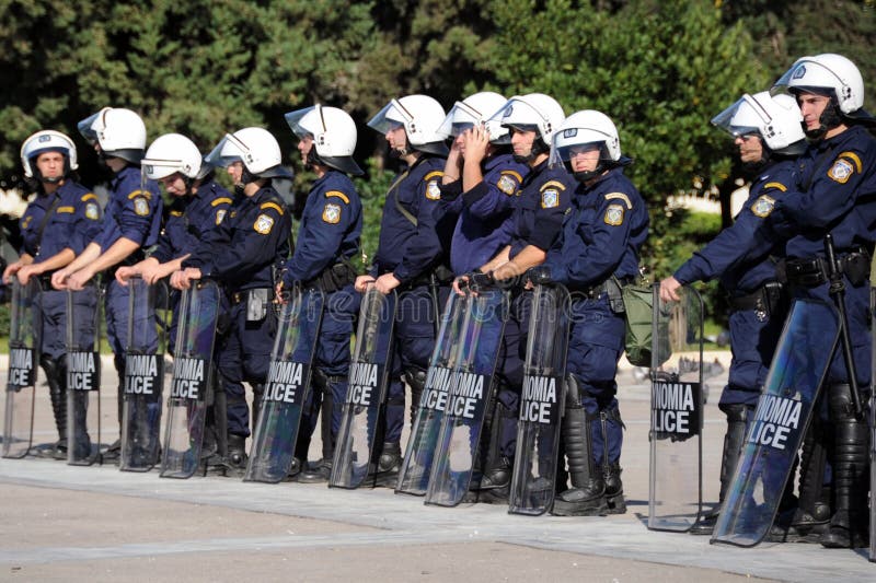 Police standing in front of parliament building in Greece capital while students and young people protest against government because of unemployment problems caused by financial crisis. Police standing in front of parliament building in Greece capital while students and young people protest against government because of unemployment problems caused by financial crisis.