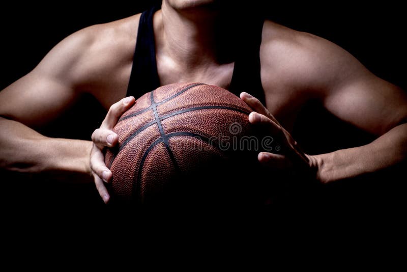 Athlet mit einem Basketball stockbilder Athlet mit einem Basketball stockbilder