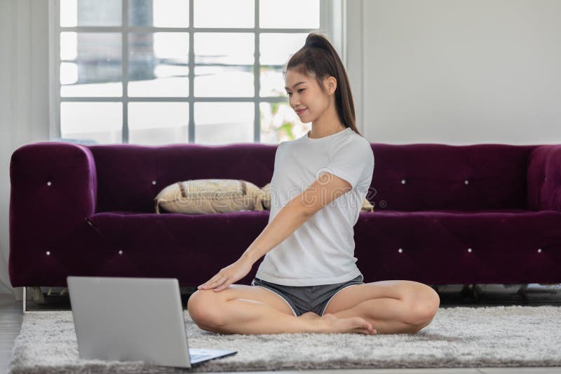 Athletic Asian Woman in Sportwear Practice Yoga Cat Cow Pose To Meditation  at Home Stock Photo - Image of meditation, happiness: 190249360