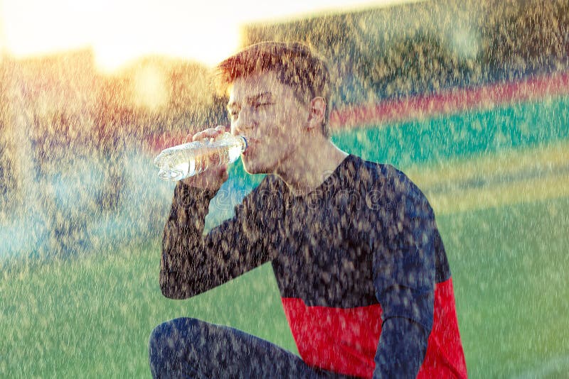 Athlete Drinks Water at the Stadium Stock Image Image of drinks