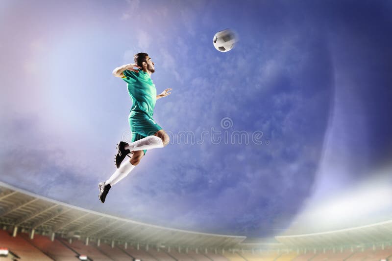 Athlete Heading Soccer Ball in Stadium Stock Photo Image of event
