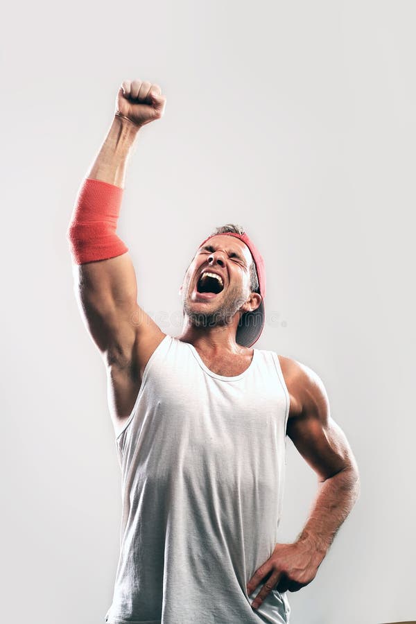 Athlete with a raised hand stock photo. Image of shout 125891036
