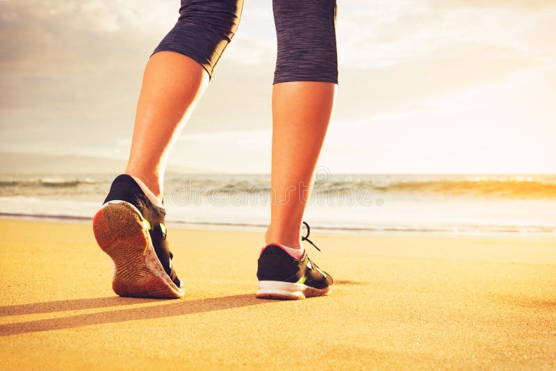 Athlete runner feet on the beach stock image Athlete runner feet on the beach stock image