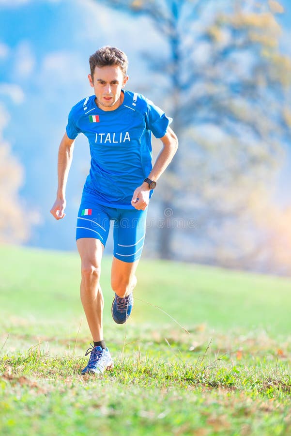 Athlete running in the mountains of the Italian national team in