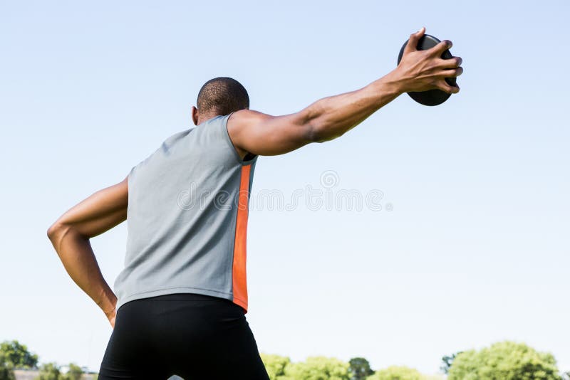 Athlete about To Throw a Discus Stock Photo Image of discus, olympics 74029858
