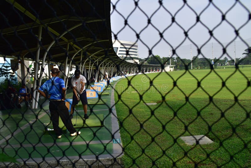 Athletes are Learning To Hit a Golf Ball at the Bintaro Editorial Image Athletes are Learning To Hit a Golf Ball at the Bintaro Editorial Image