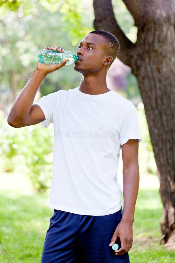 Athletic African Young Man Drinking Water Outdoor Stock Image Image