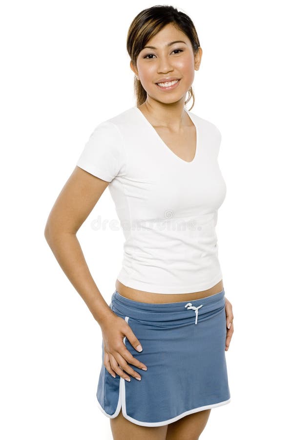A young attractive asian woman in white t-shirt and blue skirt on white background. A young attractive asian woman in white t-shirt and blue skirt on white background