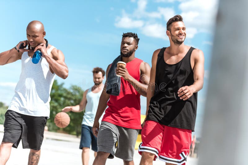 Athletic Basketball Players Walking on Court Stock Photo Image of