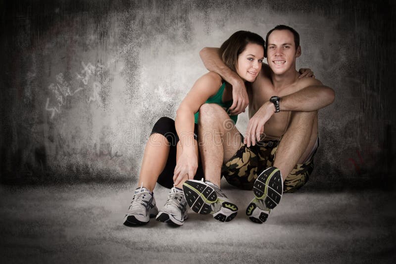 Athletic couple resting stock image