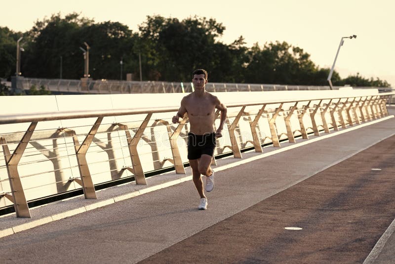 Athletic Man Runner with Muscular Torso Jogging Stock Photo Image of