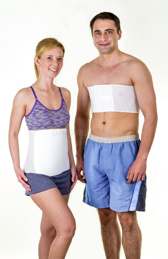 Athletic Man and Woman Wearing Back Support Braces royalty free stock photo Athletic Man and Woman Wearing Back Support Braces royalty free stock photo
