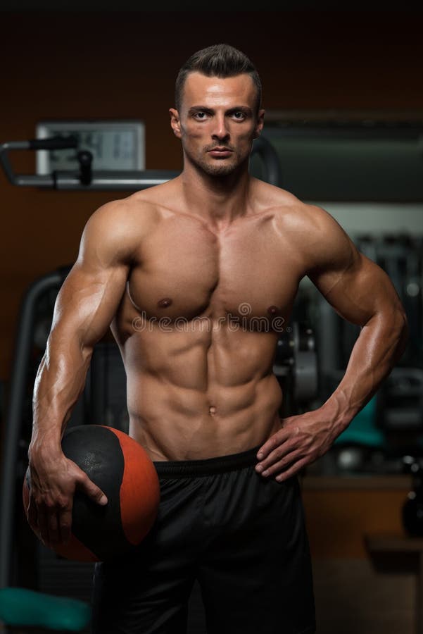 Athletic Man Workout with Medical Ball Stock Photo Image of ball