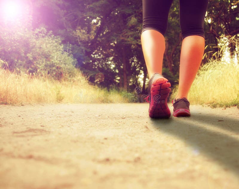 An athletic pair of legs running or jogging royalty free stock photography