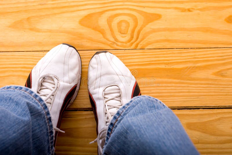 Athletic Shoes on Floor stock image. Image of blue, brown 5270749