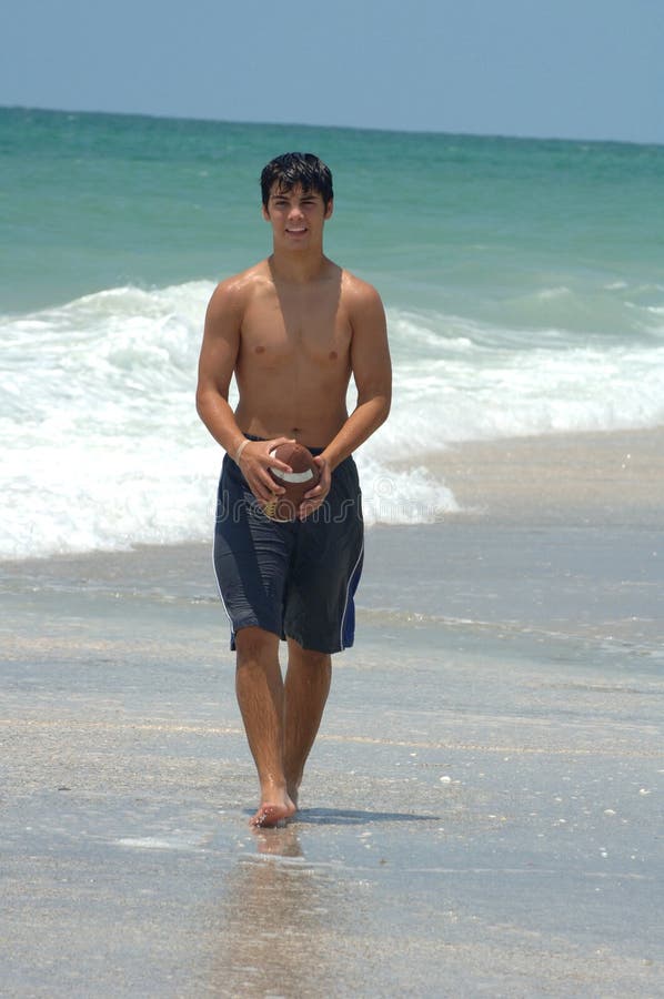 Athletic Teen boy on beach