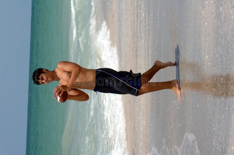 Athletic Teen boy on beach