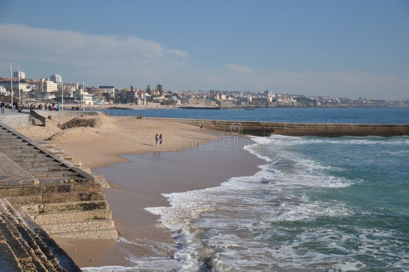 Atlantic ocean sea walk along the beach Cascais and Estoril Portugal  in the tourist towns for tourism and seaside  holidays near Lisbon coastal locations realestate property  coast no tourists after covid19. Atlantic ocean sea walk along the beach Cascais and Estoril Portugal  in the tourist towns for tourism and seaside  holidays near Lisbon coastal locations realestate property  coast no tourists after covid19