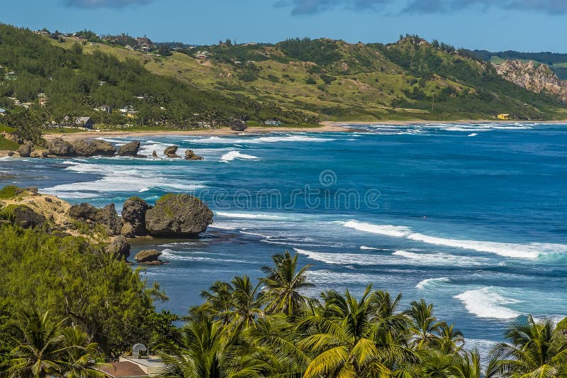 Atlantic roller waves erode the boulders of Bathsheba Beach on the east coast of Barbados